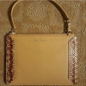 Cole Haan Wristlet.Brand new.Never used.Tan leathe